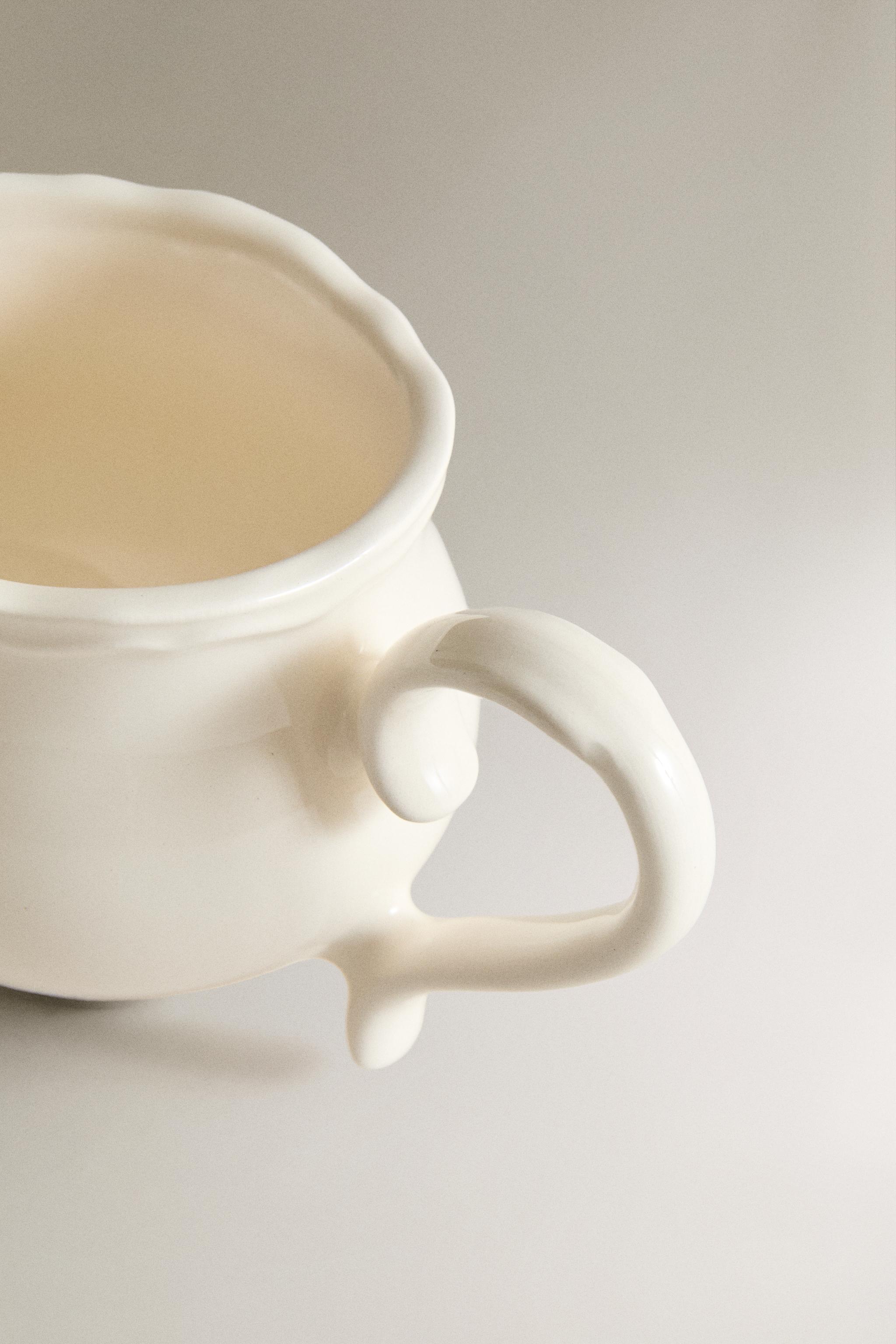 FLORAL EARTHENWARE CREAM PITCHER